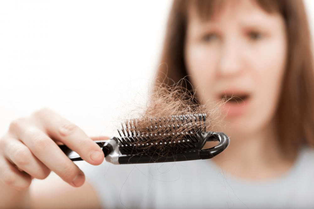 loss-hair-comb-in-women